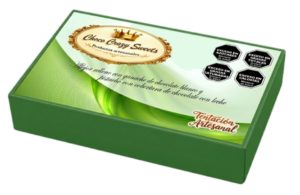 Caja x 6 Alfajores rellenos con ganache de chocolate blanco con pistachos molidos bañados en chocolate con leche