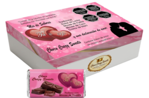 Caja x 10 unidades de Tú y Yo, de chocolate con leche. 5 diferentes rellenos, en cada unidad, sticker autoadhesivo con frase de amor.